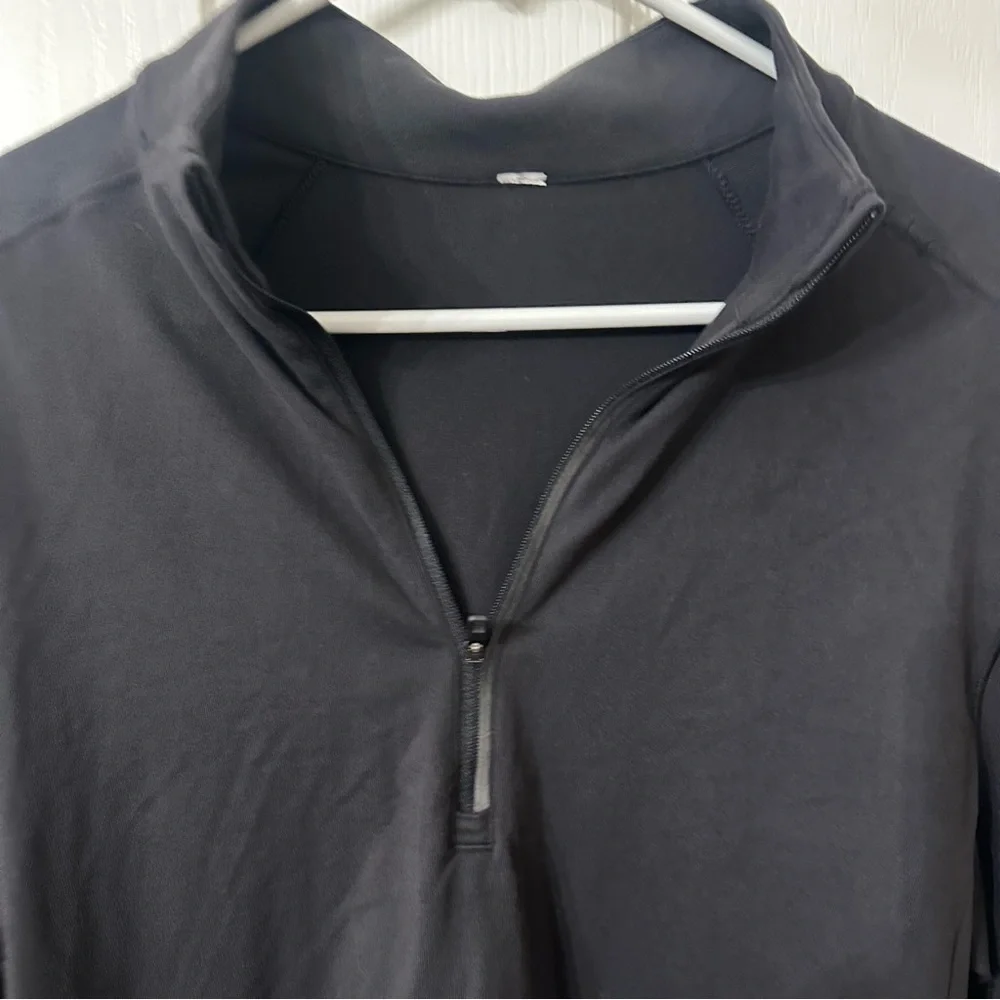 Men’s lululemon Surge Warm Half Zip in black, S